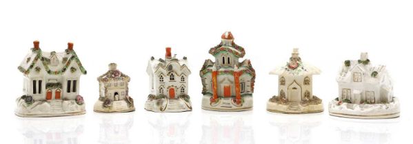 A group of six Staffordshire 'Cottage' pastille burners,