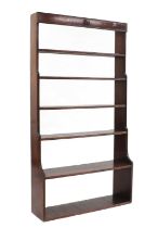 A mahogany waterfall bookcase,