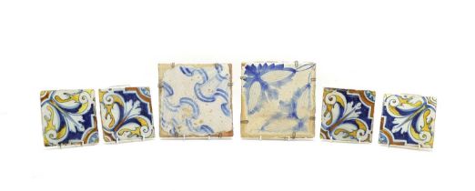 A group of four Spanish polychrome tiles,