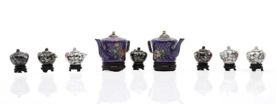 A collection of nine Chinese cloisonne teapots,