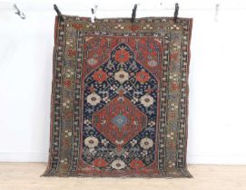 A Persian Bidajr wool rug