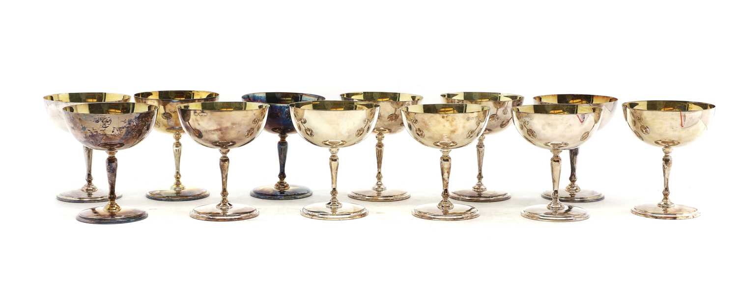 A set of twelve silver champagne goblets