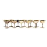 A set of twelve silver champagne goblets