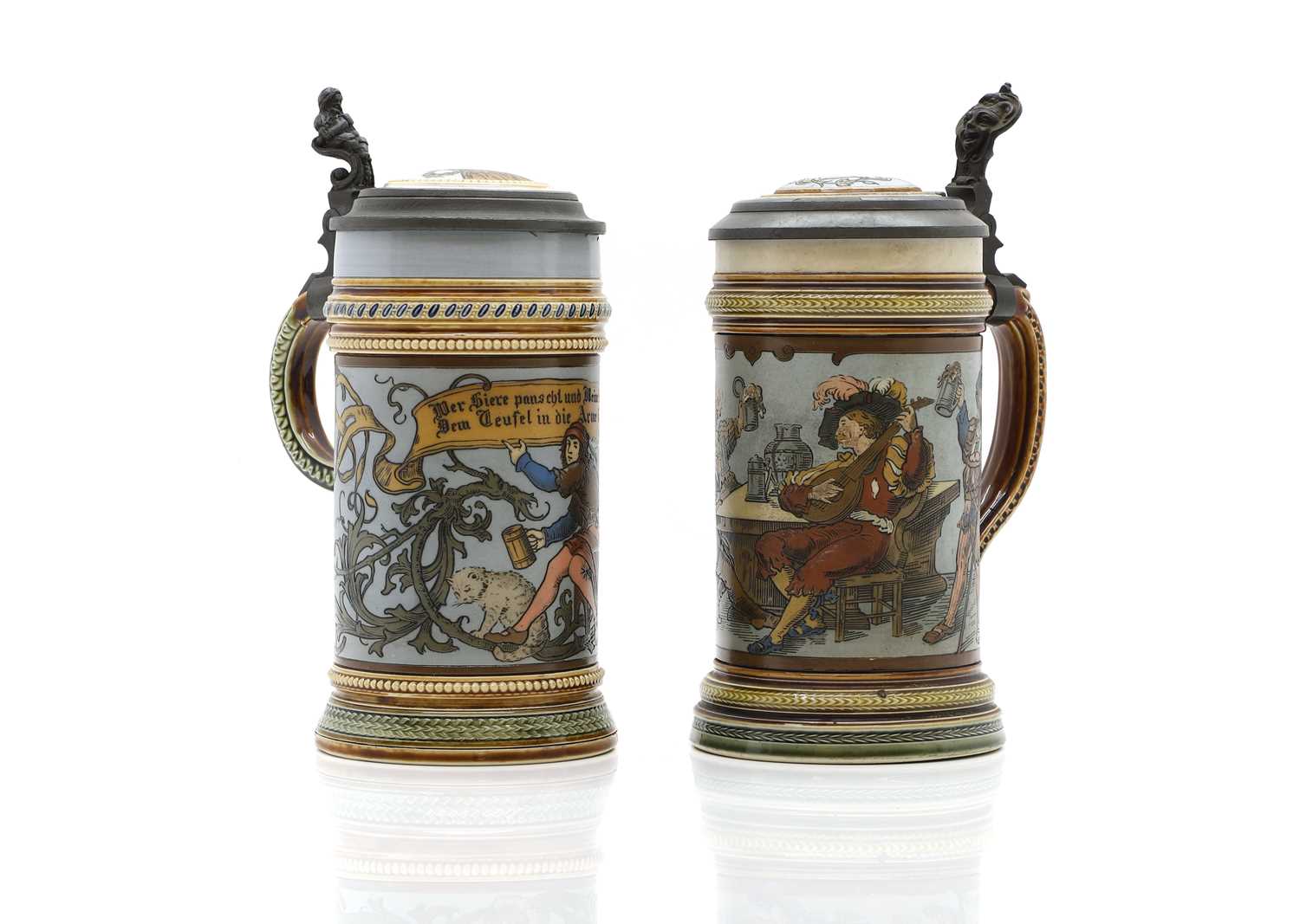 Two Mettlach stoneware beer steins,