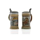 Two Mettlach stoneware beer steins,