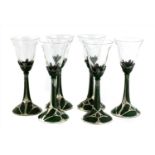 A set of six Art Nouveau-style wine glasses,