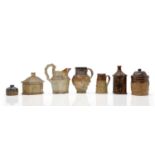 A collection of salt-glazed stoneware items