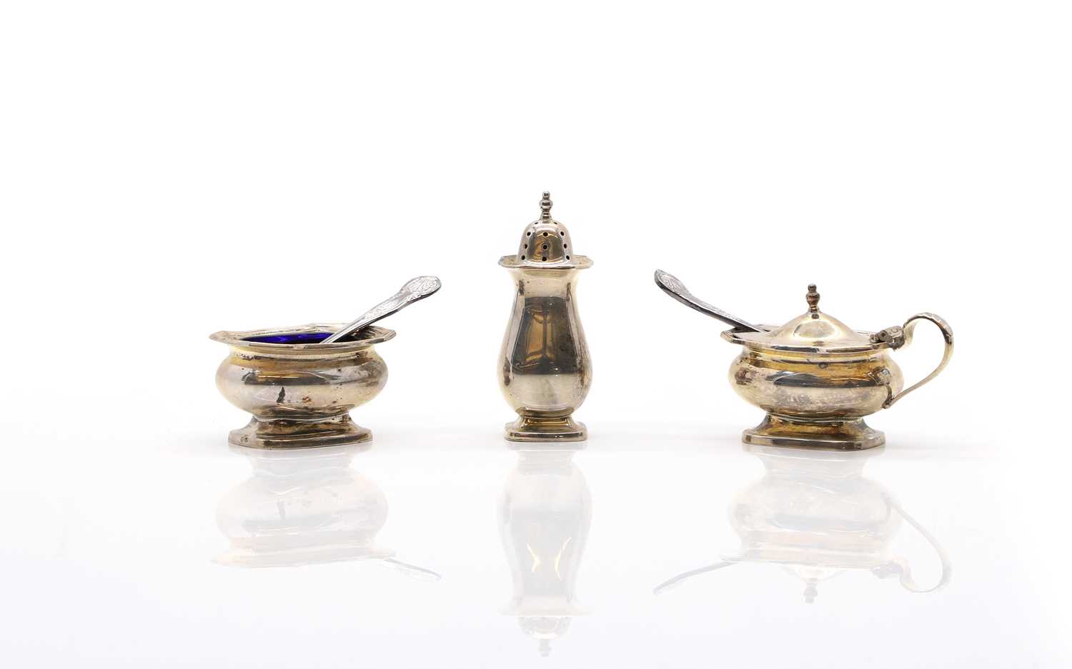 A cased silver cruet set,