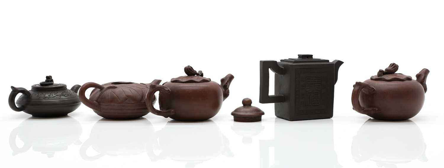 A group of five Chinese Yixing stoneware teapots,