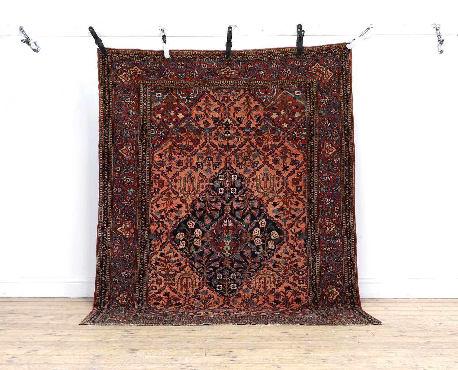 A Kashan wool rug