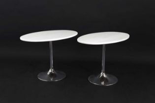 A pair of contemporary oval marble tables,