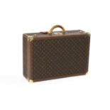A Louis Vuitton monogrammed canvas 'Alzer 65' suitcase,