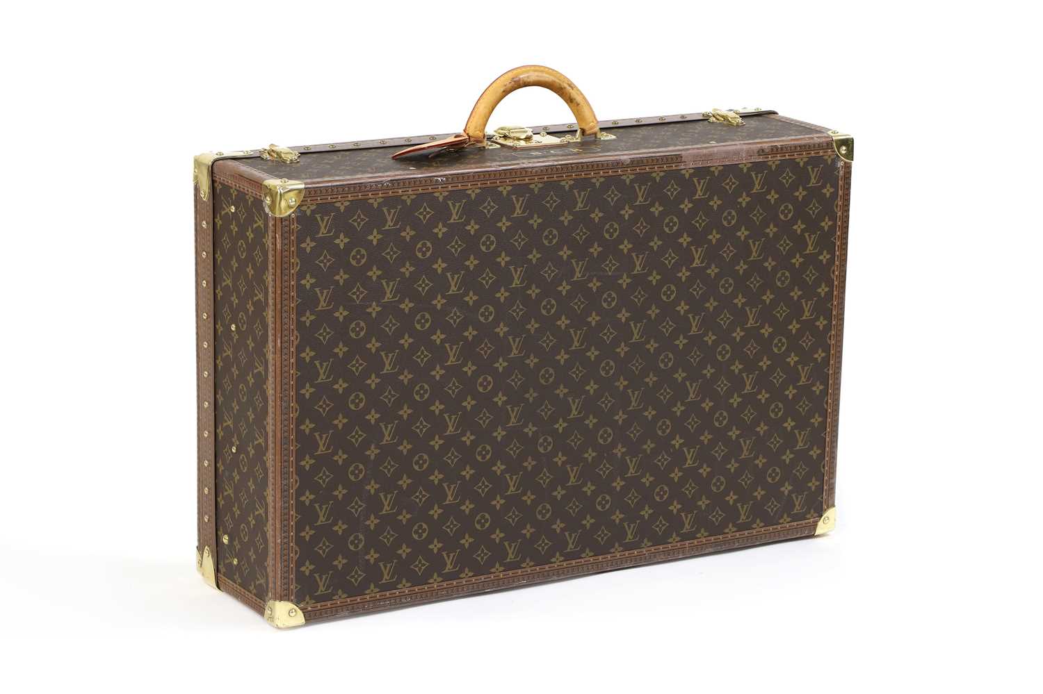A Louis Vuitton monogrammed canvas 'Alzer 75' suitcase,