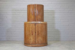 An Art Deco walnut cocktail cabinet,