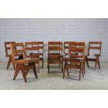 A set of ten French teak dining chairs,