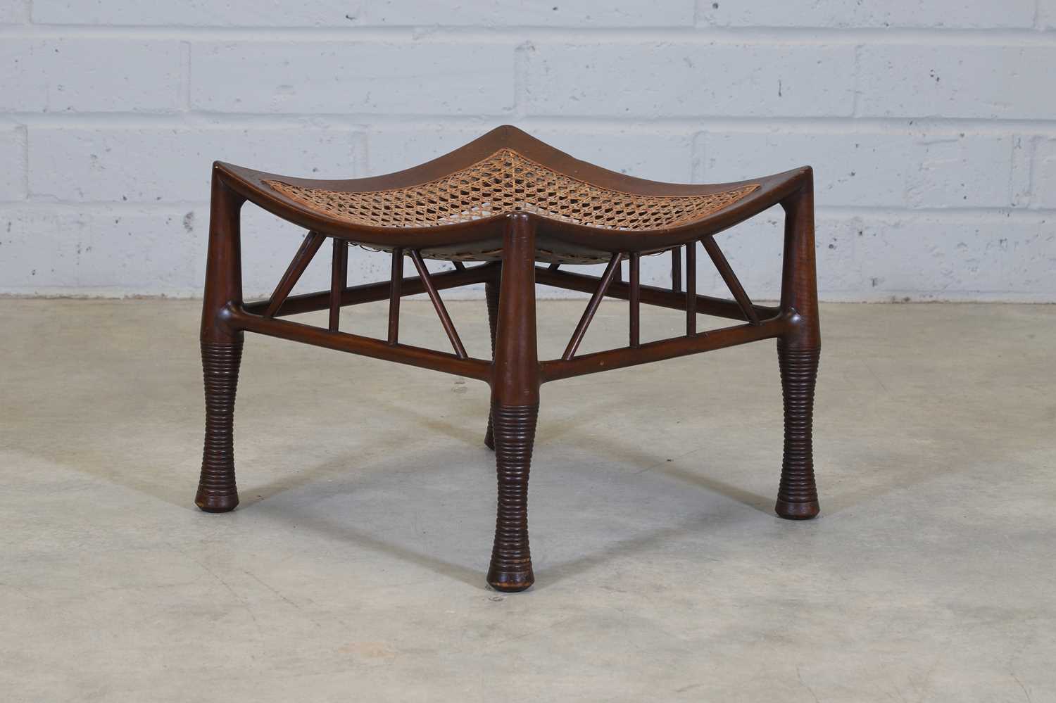 A mahogany Thebes stool,