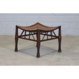 A mahogany Thebes stool,