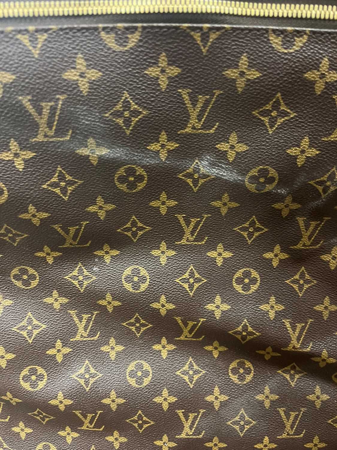 A Louis Vuitton monogrammed canvas suit bag, - Image 10 of 26