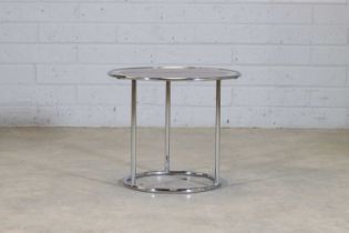 A modernist chrome and glass centre table,