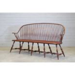 An American elm model 'SCH5a Continuous Arm Settee',