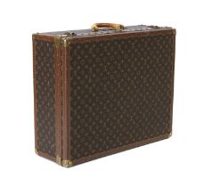 A Louis Vuitton monogrammed canvas 'Braken 65' suitcase,