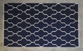 A contemporary flat-weave carpet,