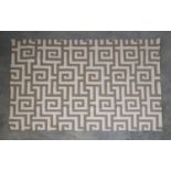 A contemporary flat-weave rug,