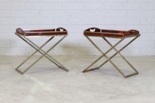 A pair of faux tortoiseshell tray tables,