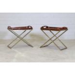 A pair of faux tortoiseshell tray tables,