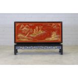 A chinoiserie ebonised and lacquered sideboard,