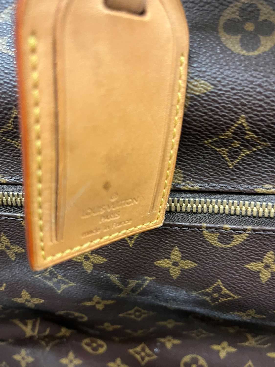 A Louis Vuitton monogrammed canvas suit bag, - Image 25 of 26