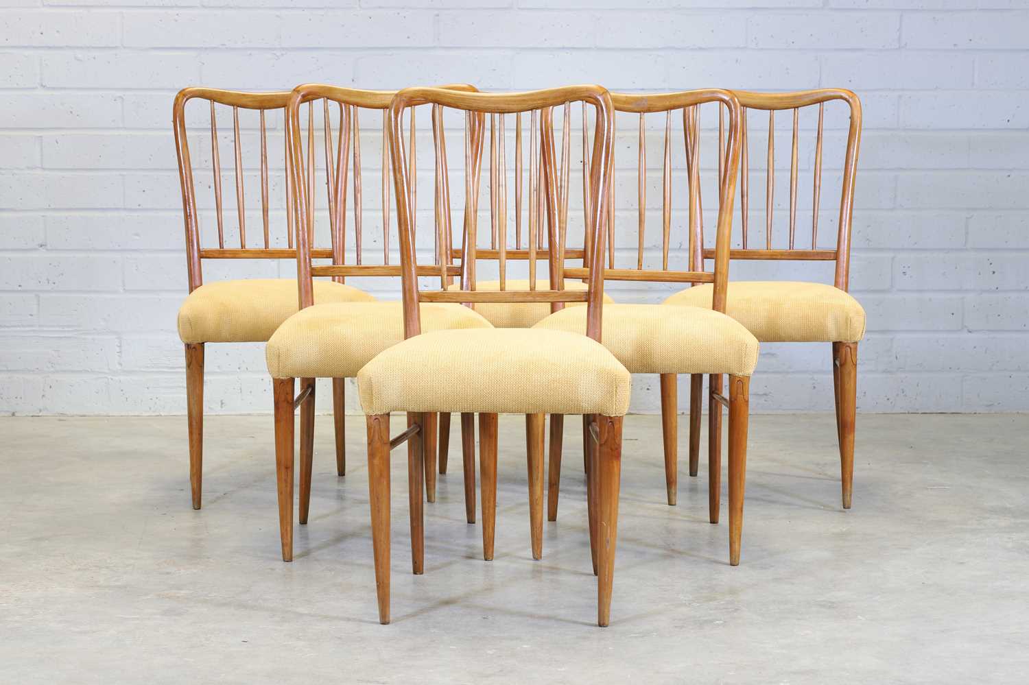 A set of six Italian fruitwood chairs,