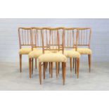 A set of six Italian fruitwood chairs,