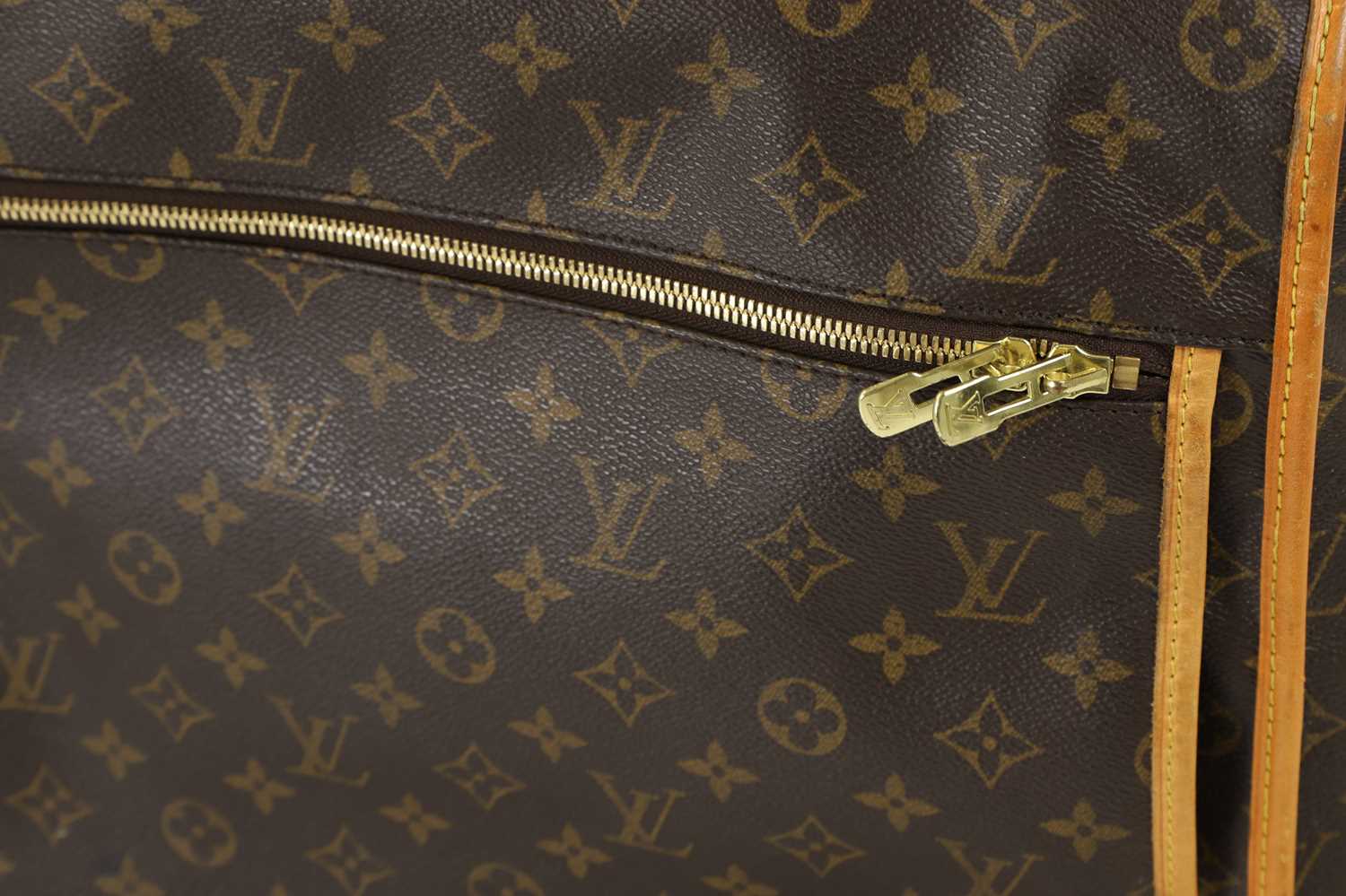 A Louis Vuitton monogrammed canvas suit bag, - Image 3 of 25