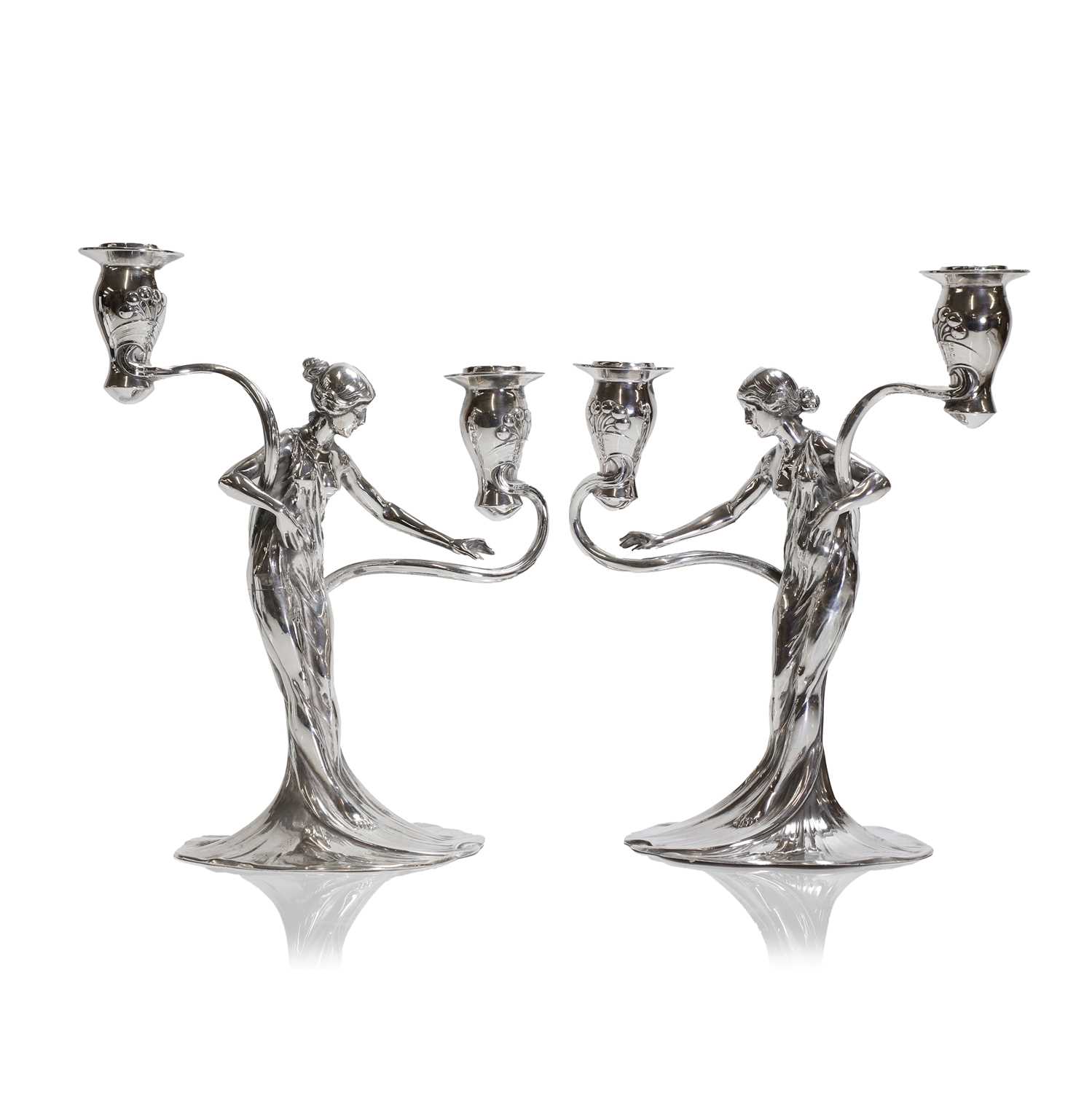 A pair of German Art Nouveau silvered-pewter candelabra,