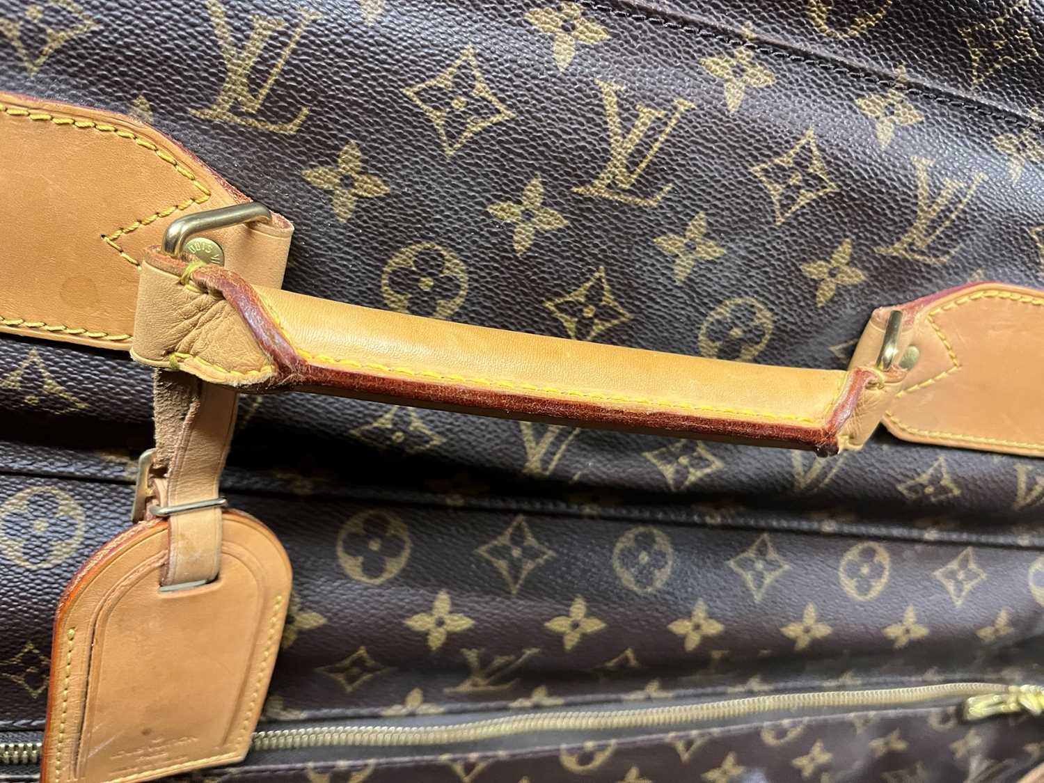 A Louis Vuitton monogrammed canvas suit bag, - Image 21 of 26