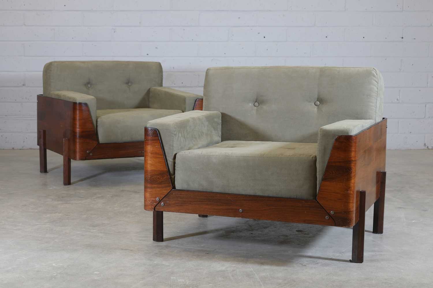 § A pair of Brazilian rosewood armchairs,