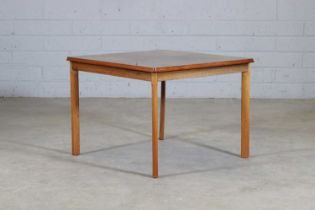 § A Norwegian rosewood coffee table,