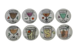 A set of eight Fornasetti 'Cocktail' porcelain coasters,