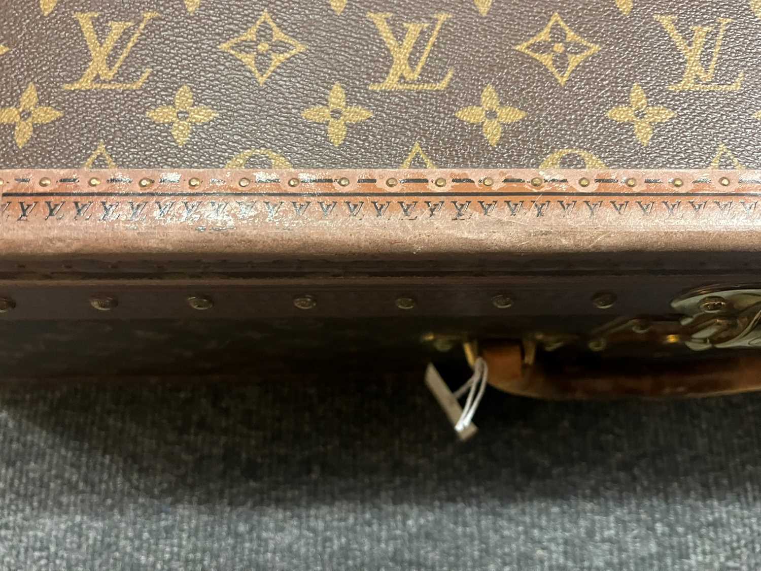 A Louis Vuitton monogrammed canvas 'Alzer 80' suitcase, - Image 31 of 32