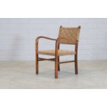 A Swedish stained beech bentwood armchair,