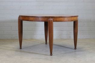 A French Art Deco walnut and mahogany dining table,