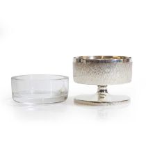 ▲ A textured sterling silver pedestal bowl,