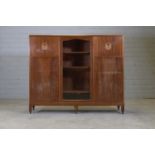 A mahogany and satinwood bookcase,