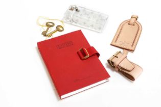 A collection of Louis Vuitton travel items,