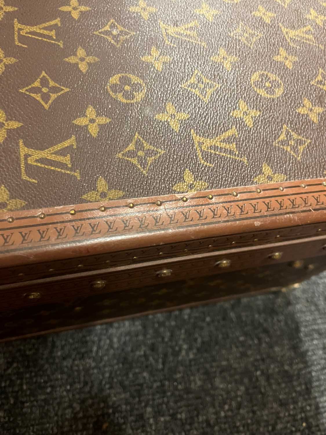 A Louis Vuitton monogrammed canvas 'Alzer 65' suitcase, - Image 27 of 28