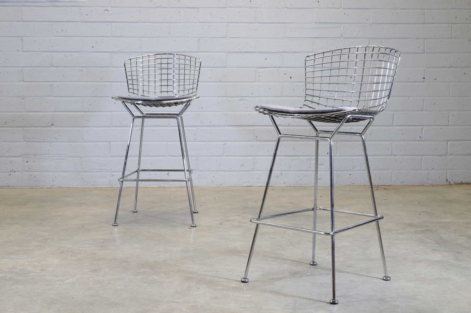 A pair of Bertoia bar stools,