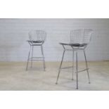 A pair of Bertoia bar stools,