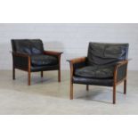 § A pair of Danish rosewood and leather chairs,