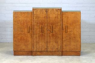 An Art Deco walnut breakfront sideboard,